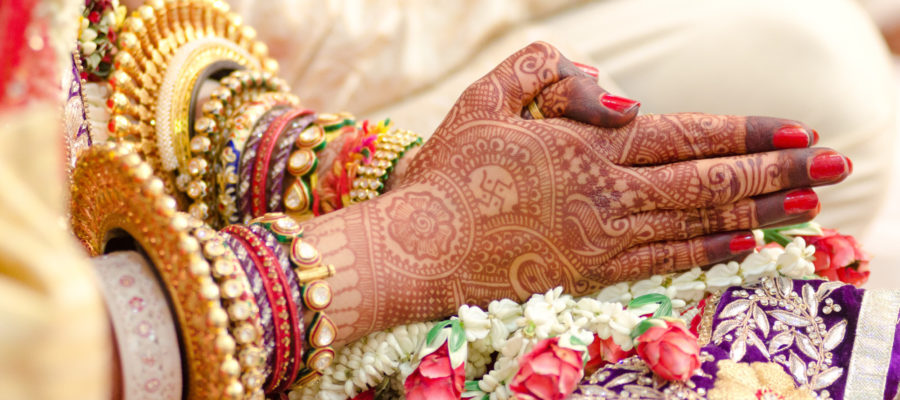 Henna decorated hands,bridal jewelery